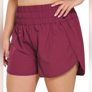 Zenana Plus Size Windbreaker Smocked Waistband Running Shorts Nylon Cabernet
